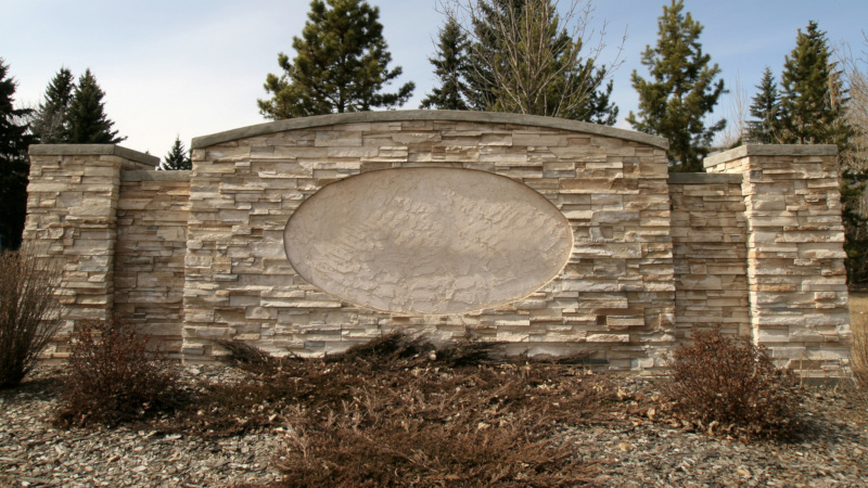 a well-marked and visible stone sign